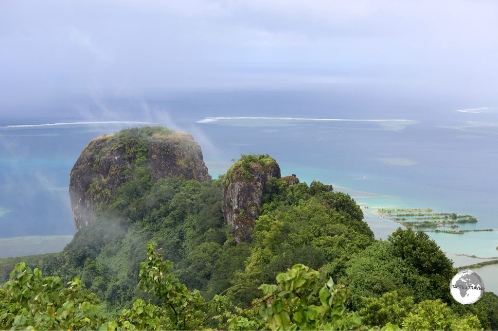 Sokehs Rock, a gigantic exposed basalt volcanic plug is the most striking feature of Pohnpei’s topography