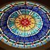 The beautiful stained-glass dome at the Beit Al Quran museum mosque.