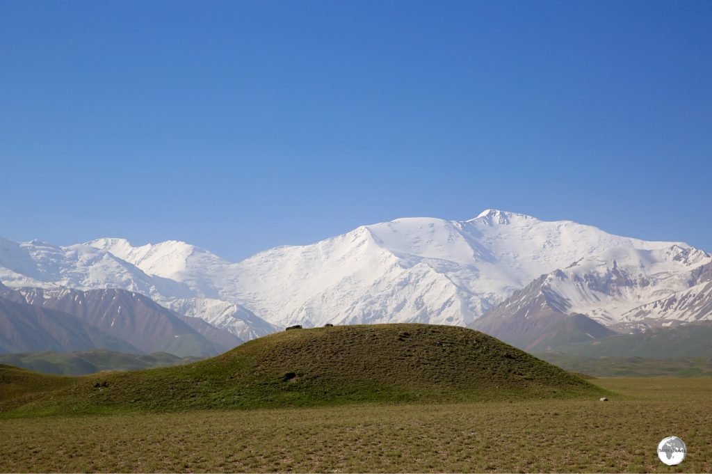 The snow-covered Lenin Peak (7,134 metres / 23,406 ft) marks the border between Kyrgyzstan and Tajikistan.