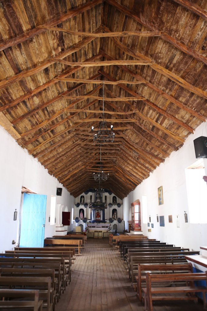 The interior of the Church of San Pedro de Atacama, a Catholic church in San Pedro de Atacama, Chile which was constructed during the Spanish colonial period.