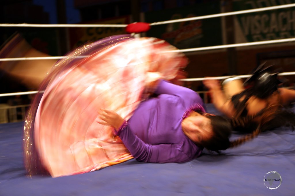 Cholita wrestling is inspired by the 'lucha libre' style of wrestling, which originated in Mexico.