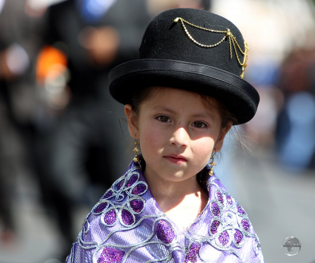 A young participant in the 'Fiesta de la Virgen de Guadalupe' in Sucre, Bolivia.