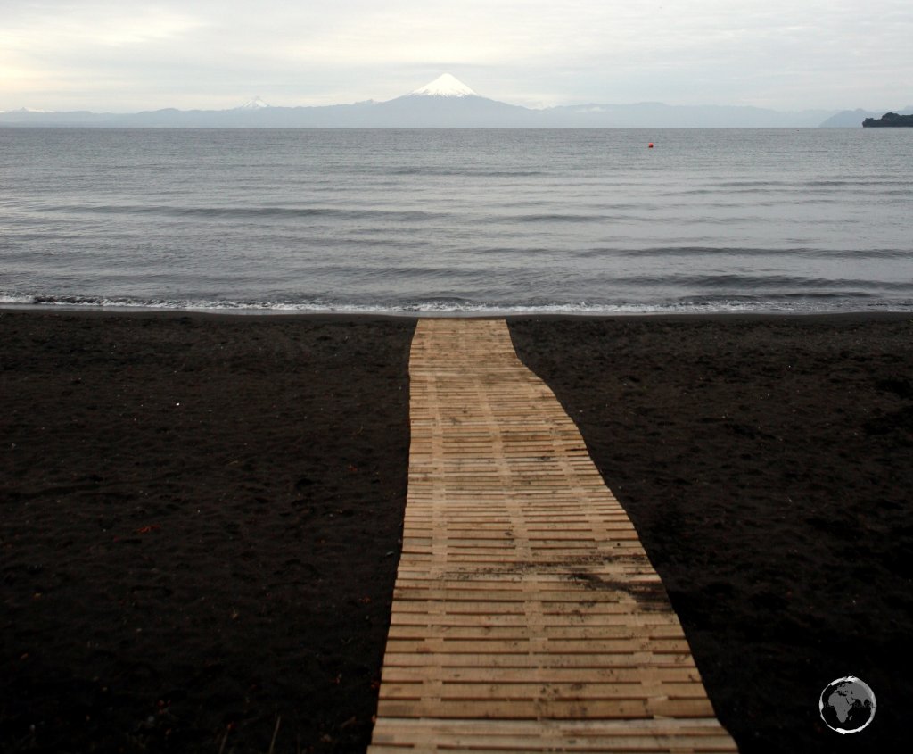 A view of Osorno volcano and Lake Llanquihue from the lakeside town of Puerto Varas.