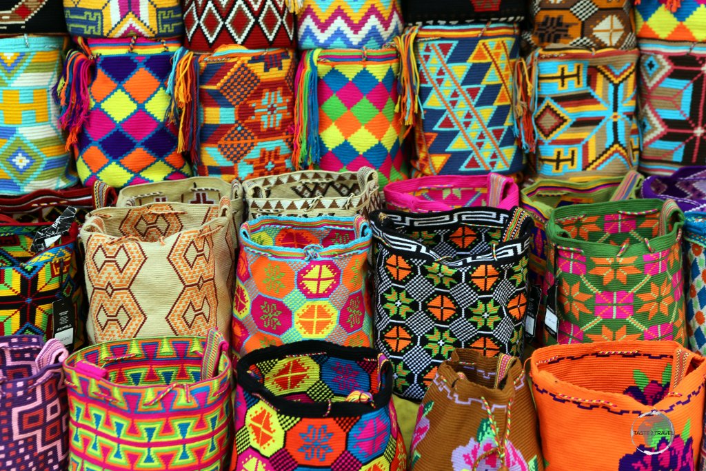 Brightly coloured with beautiful patterns, Wayuu Mochila bags, which are produced by local native Indians, are a popular souvenir item in Cartagena old town.