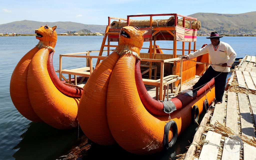 Two orange pumas rear up on Lake Titicaca! A beautifully constructed Totora reed boat on the Uros Islands, which provides inter-island transport.
