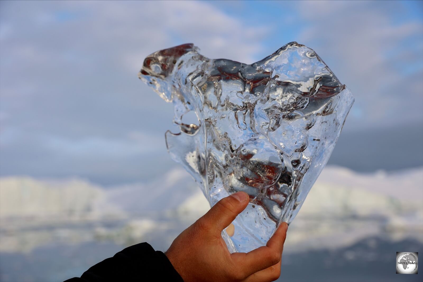 Crystal-clear glacier ice from the waters of Disko Bay.