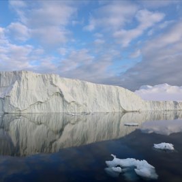 Cover Photo: Giant icebergs block the entrance to the Ilulissat Icefjord.