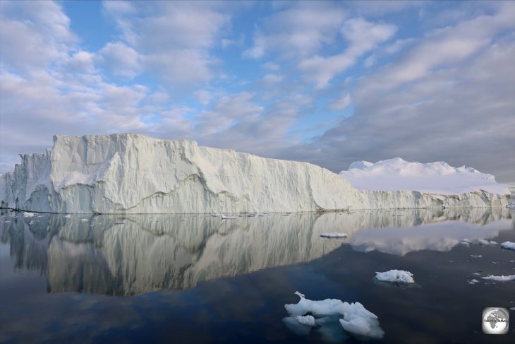 Cover Photo: Giant icebergs block the entrance to the Ilulissat Icefjord.