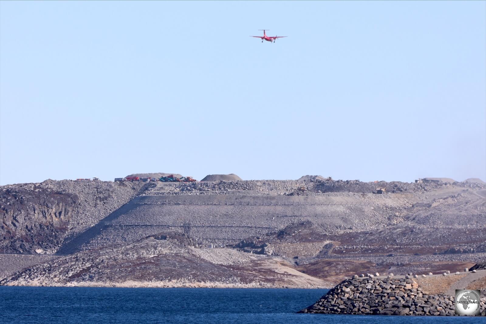 A view of the huge earthworks program which supports the extended runway at Nuuk airport.