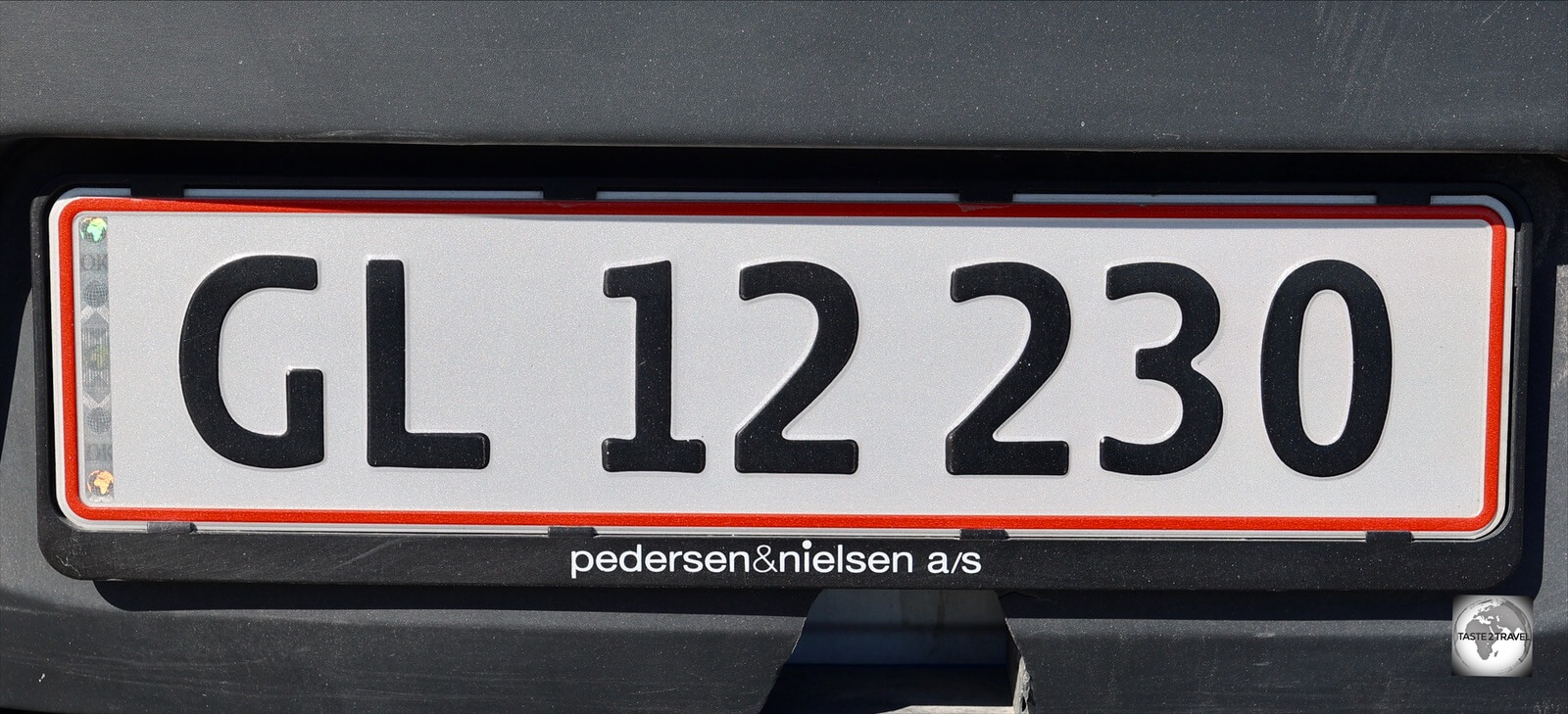 Car license plates in Greenland follow the Danish design but are prefixed with either 'GL' or 'GR'.