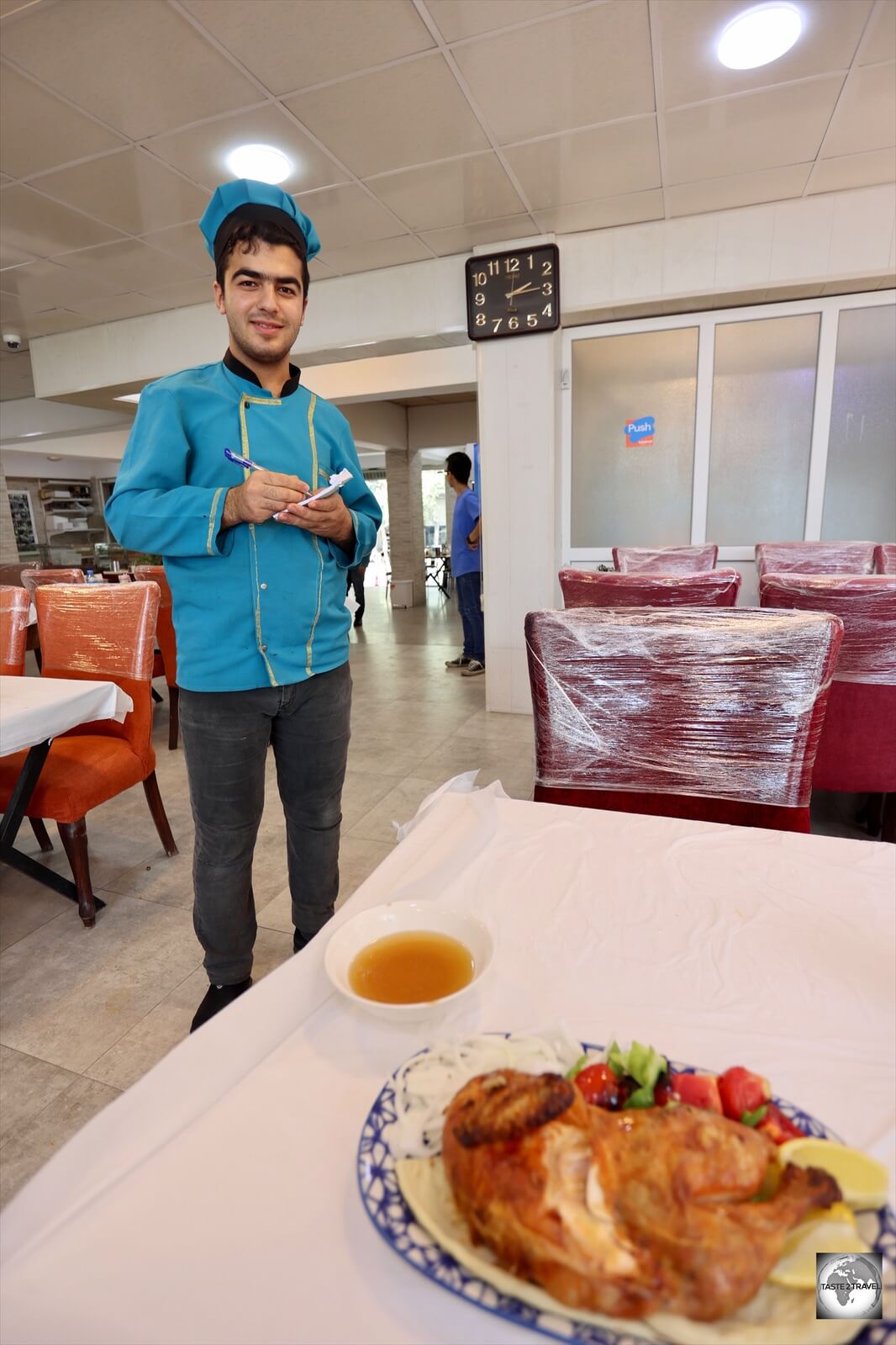 The friendly server at a restaurant in Sulaimaniyah. 