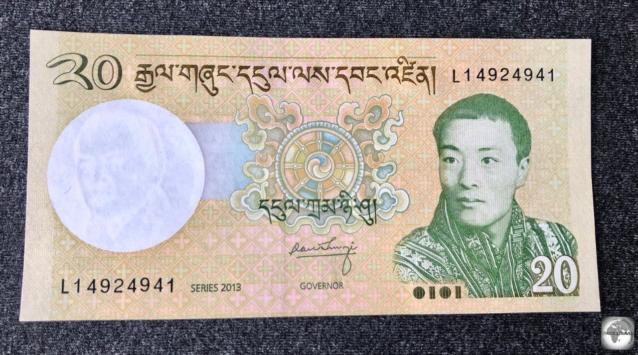 A 20-Ngultrum banknote which features Jigme Dorji Wangchuck, the 3rd king of Bhutan.