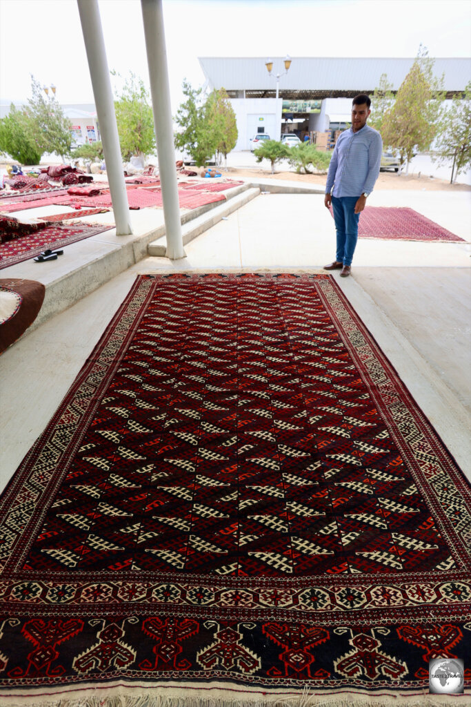 My guide, Kemal, provides a sense of scale to the bargain of the century. I was offered this handwoven Turkmen carpet for just US$50!! Incredible!