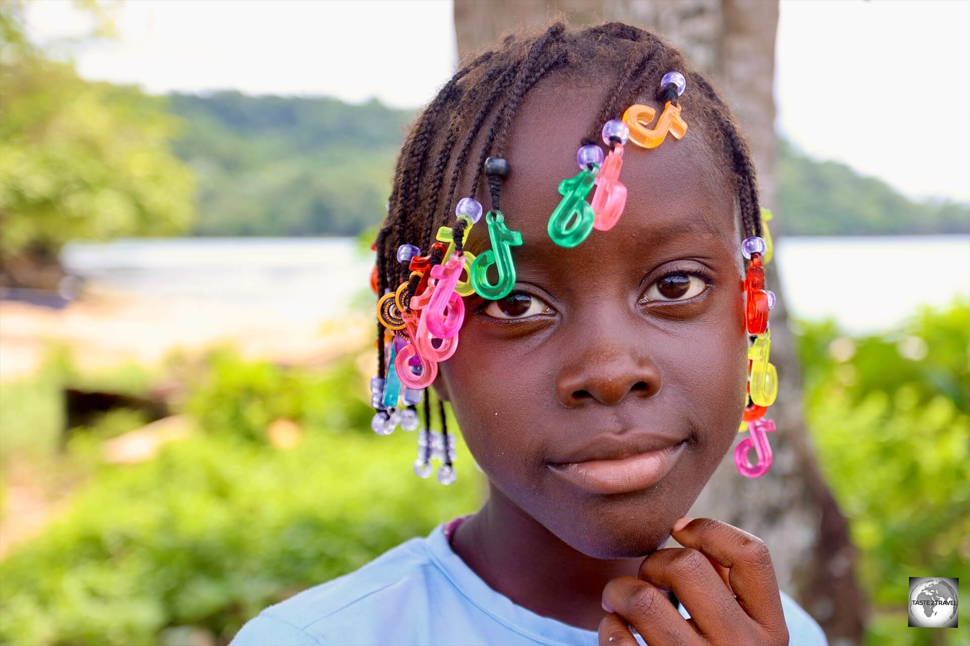 A young girl, relaxing on Principe Island.