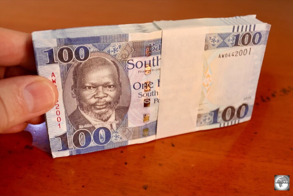 My wad of 100 x 100 SSP bank notes (valued at US$4).