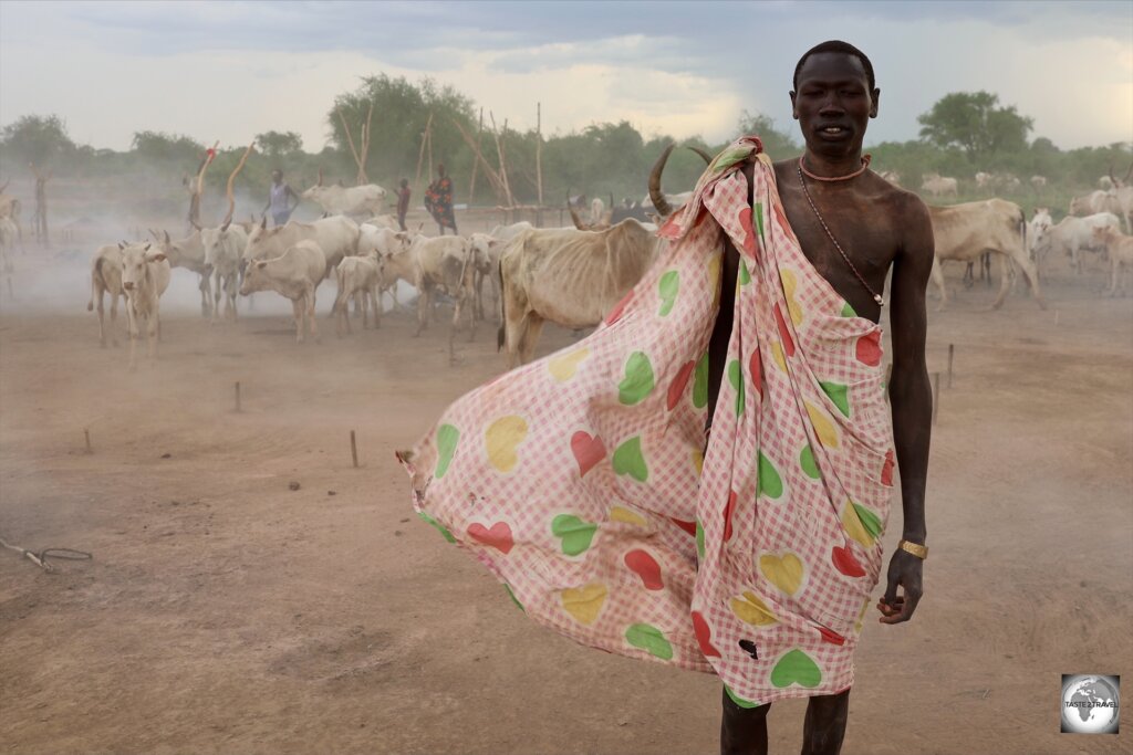 A Mundari man in a sudden gust of wind.