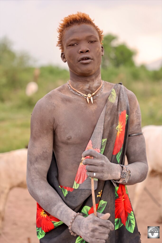 A Mundari cattle herder, covered in cow-dung ash.