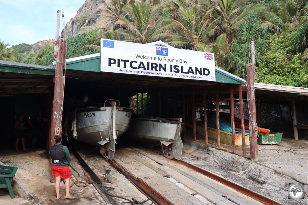 Departure from Pitcairn: The "Moss" longboat in the longboat shed, prior to being launched.