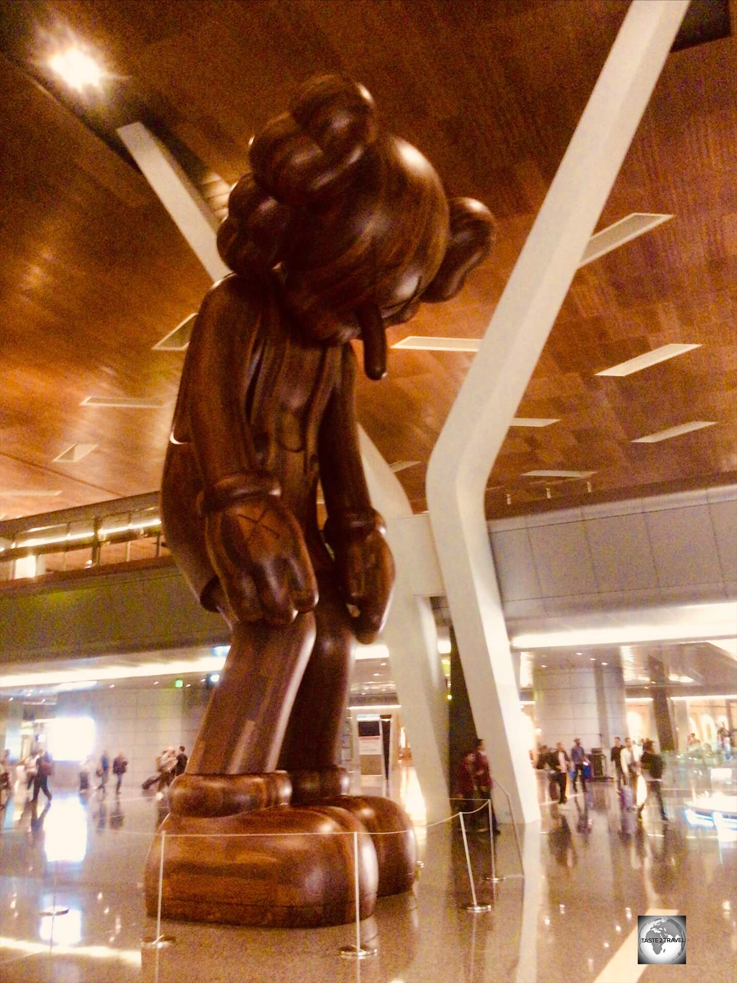 One of the many impressive artworks at Doha International Airport - the 32 feet tall 'Small Lie' is the work of American artist KAWS.