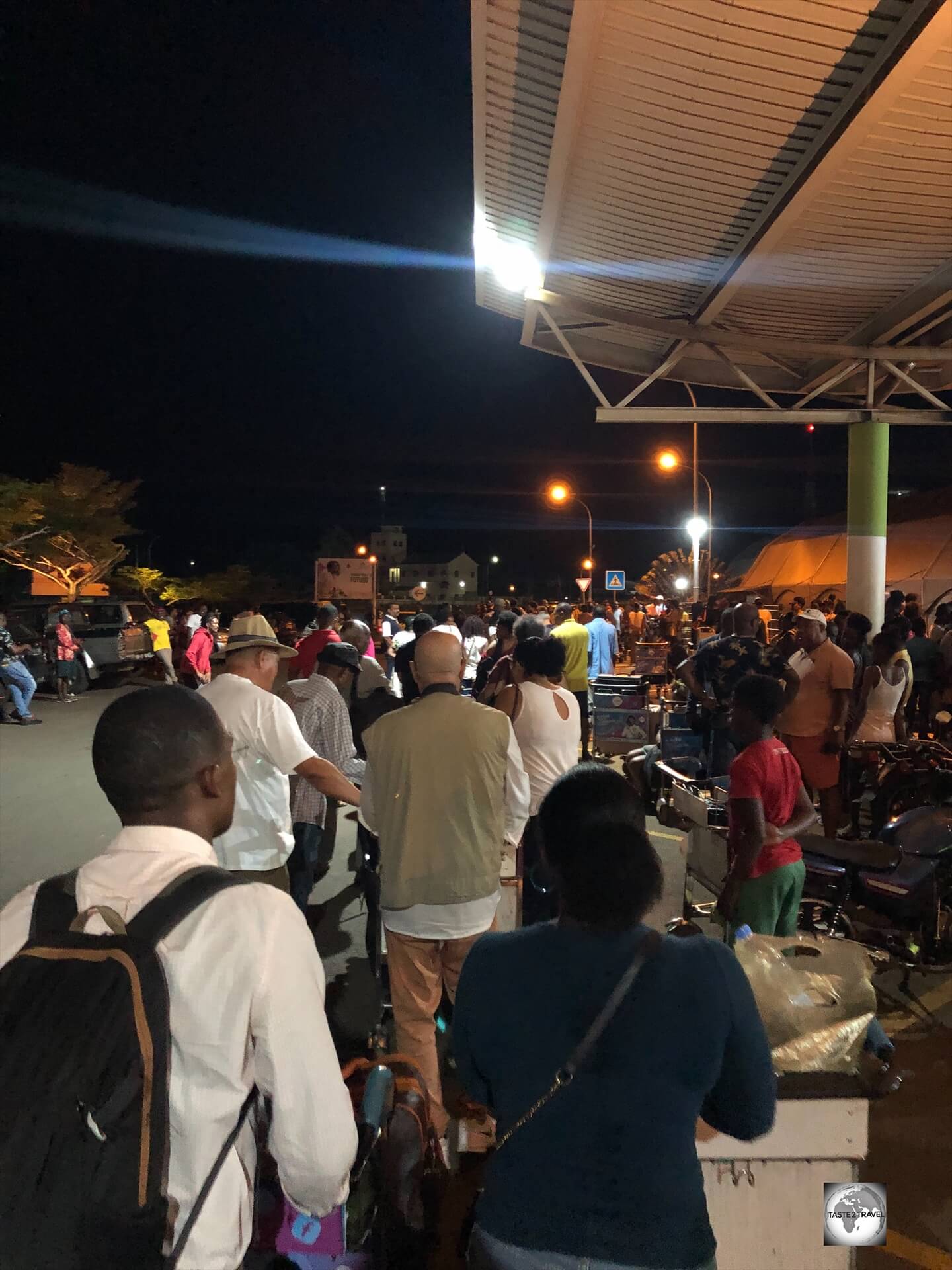 Lining up, outside São Tomé International Airport at 4 am, waiting to pass through the security check.